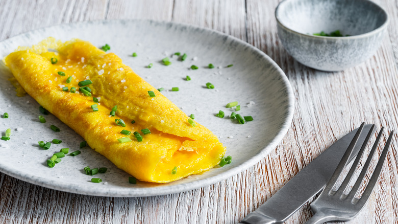 Omelet garnished with chives