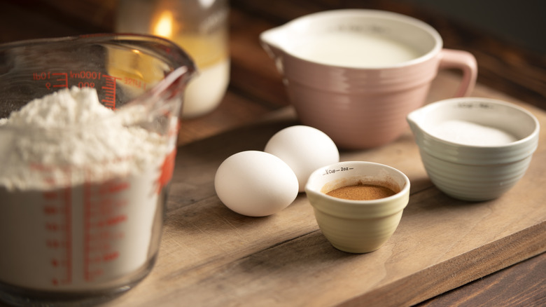 various wet and dry baking ingredients on a table