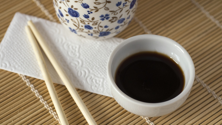 A small bowl of soy sauce