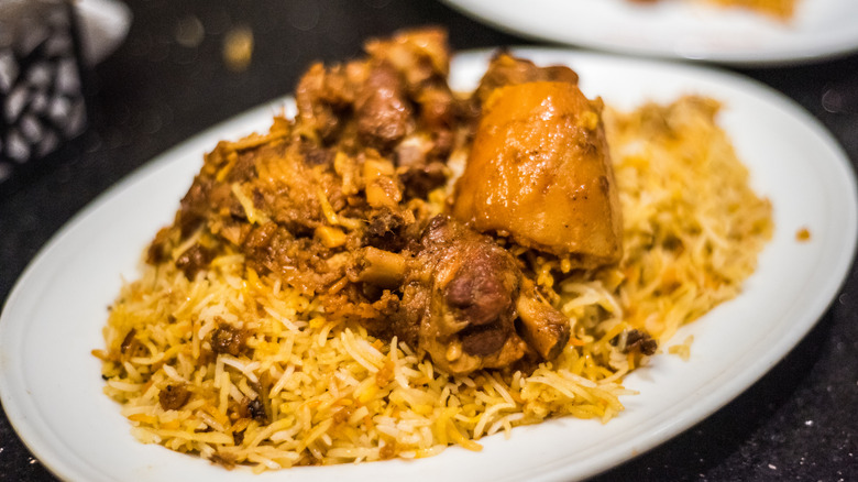 Lamb biryani with a lamb shank and basmati rice