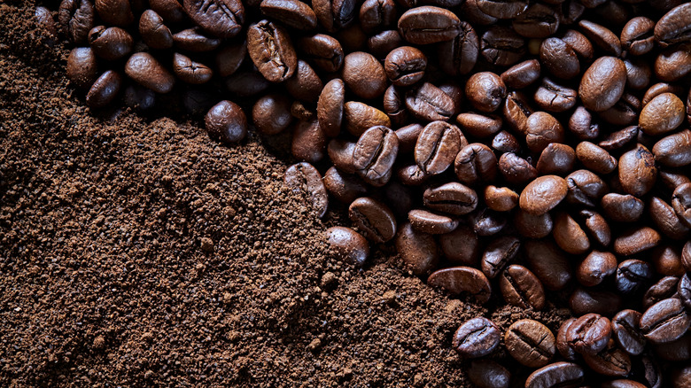 Coffee beans, whole and ground, lying side by side