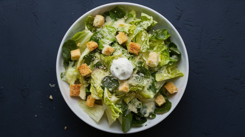 Caesar salad in white bowl