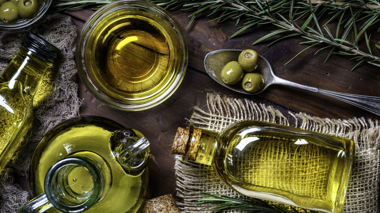 flay lay of various olive oil vessels and olives