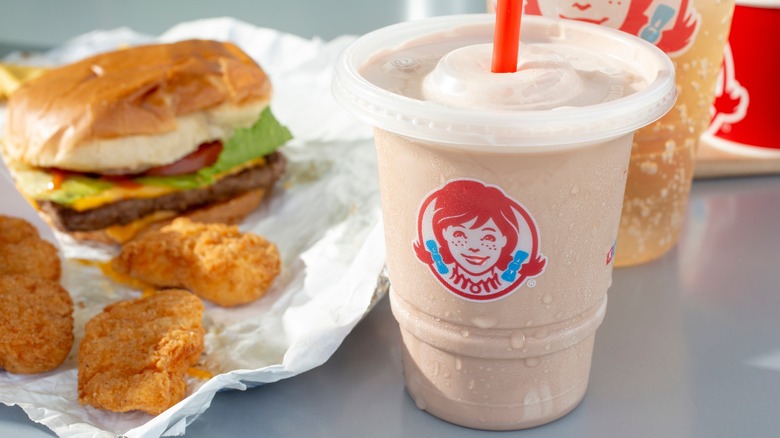 Wendy's frosty on table with food