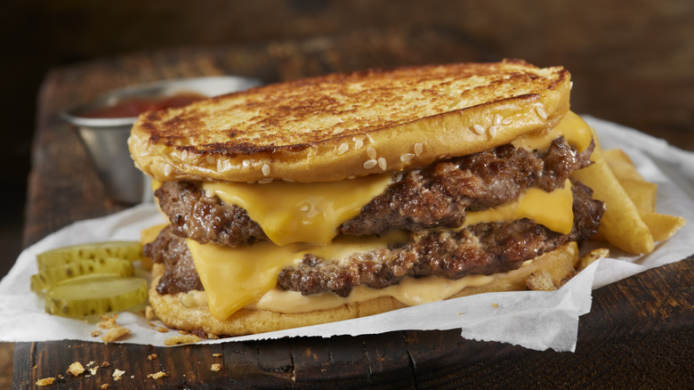 A grilled double cheese burger, similar to what one could order at Five Guys.