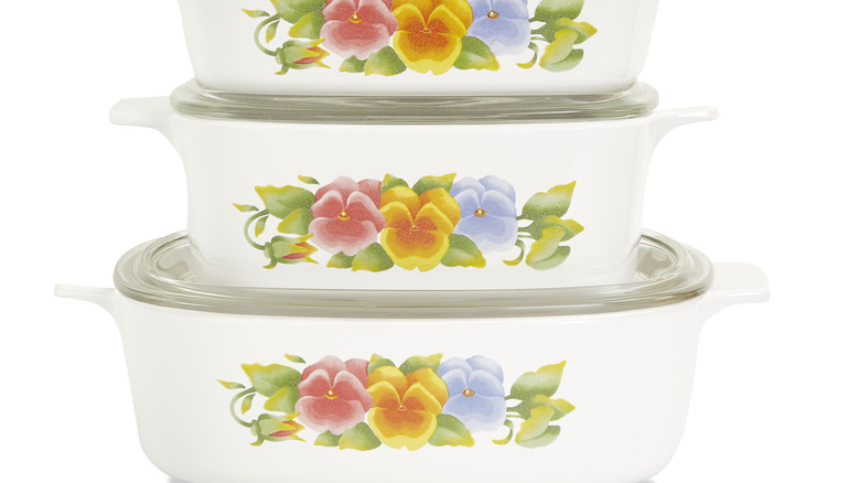 Pyrex serving dishes with flowers on them.