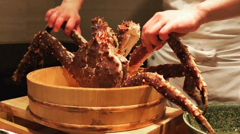 Chef at Ginza Kitafuku preparing a crab.