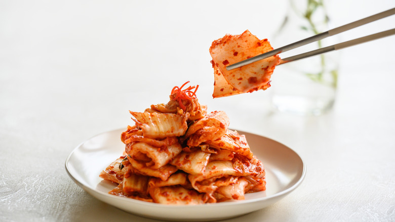 Kimchi is a Korean dish composed of spiced and fermented vegetables.