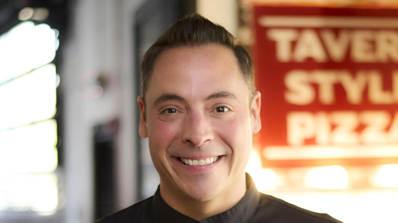 a headshot of chef jeff mauro