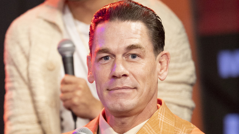 John Cena smiling at the camera.