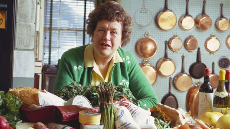 Julia Child behind the counter of her kitchen