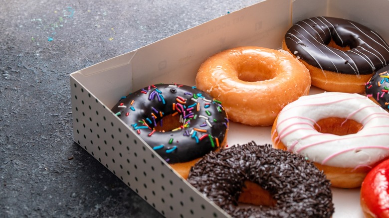 A box filled with a variety of donuts