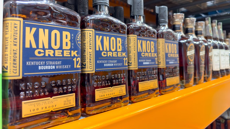 bottles of Knob Creek Bourbon on a store shelf