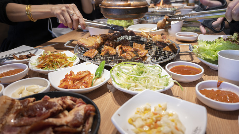 Table with grill and Korean barbecue