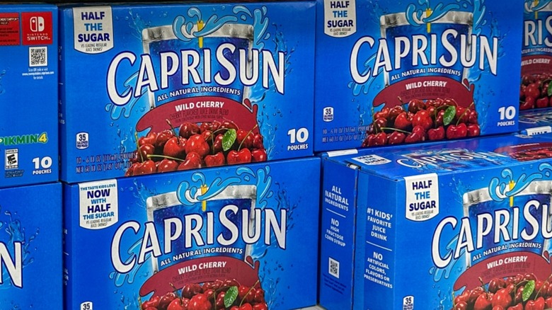 Boxes of cherry Capri Sun on store shelves