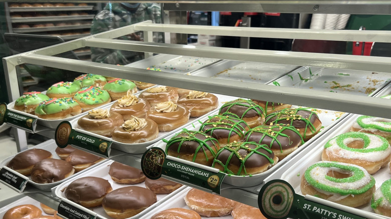 a rack of Krispy Kreme dougnuts