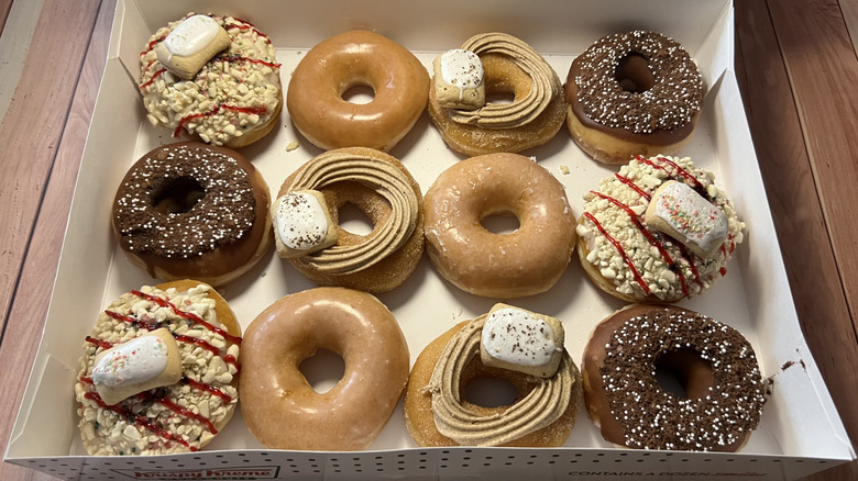 a dozen Krispy Kreme x Pop-Tarts doughnuts