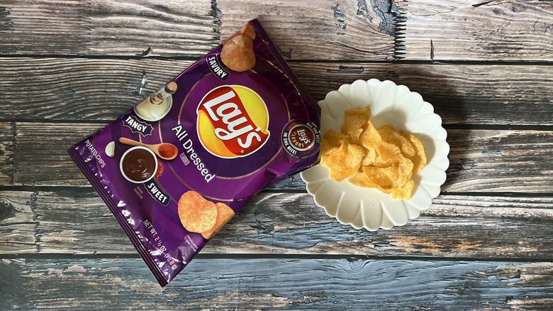 an open bag of Lay's All Dressed chips