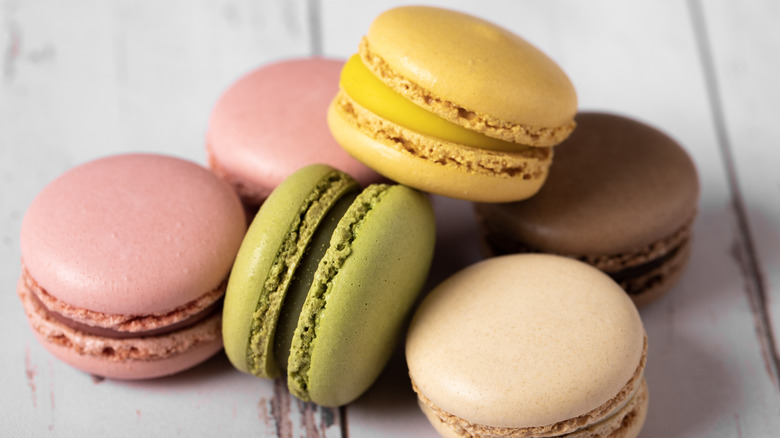 Several colorful macarons of different flavors