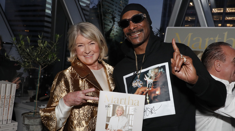 Martha Stewart and Snoop Dogg pose for photo