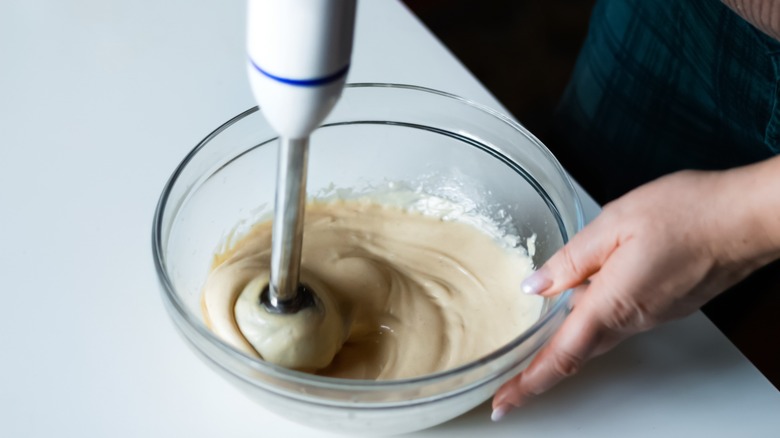 blending mayonnaise with mixer