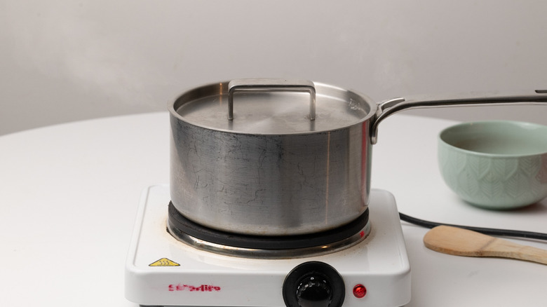 saucepan on heating element