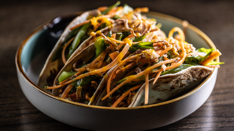 Traditional Mexican tacos on a platter