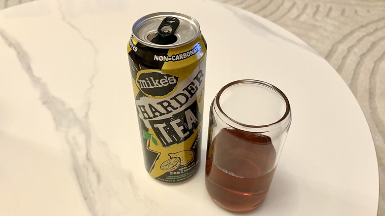 Mike's HARDER Tea Original in a can and glass