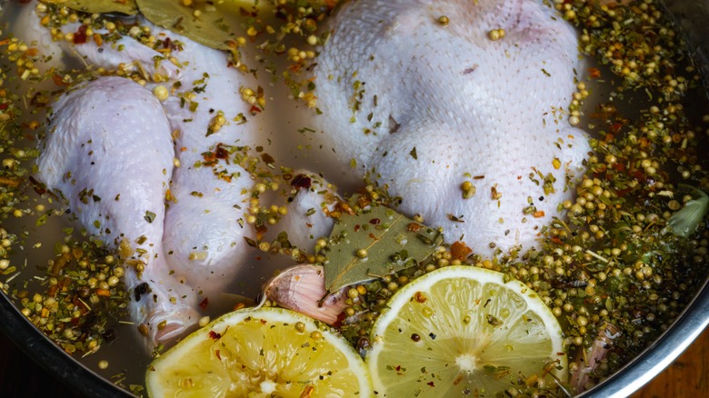 Soaking chicken in brine