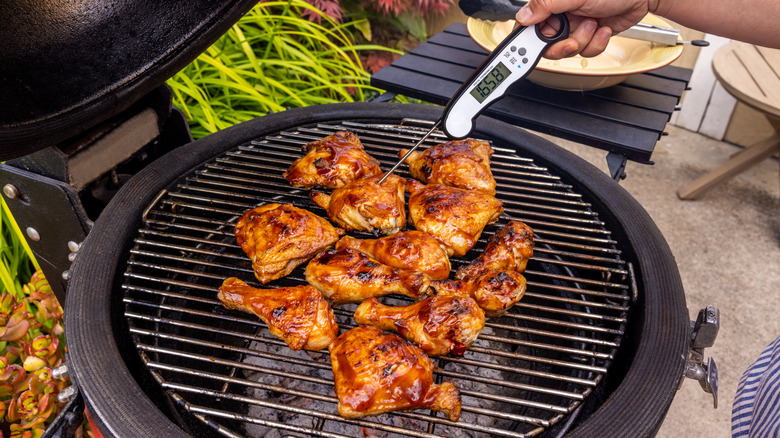 Measuring temperature of chicken on a grill