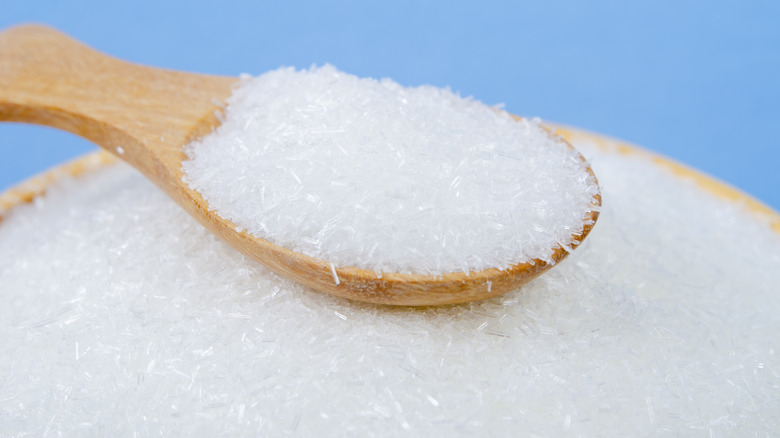 Bowl and spoon full of salt