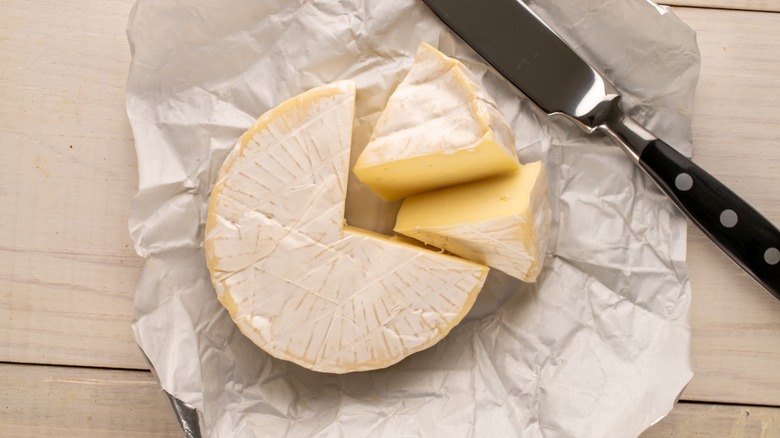 brie cut on table