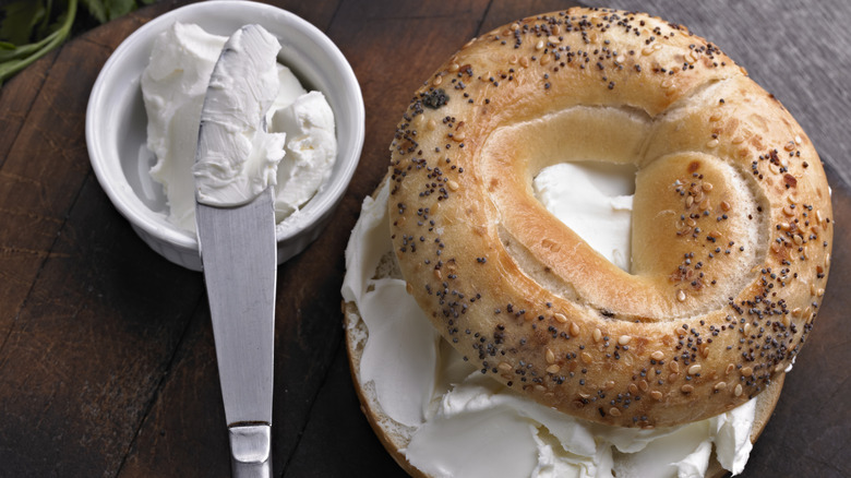 An everything bagel with cream cheese