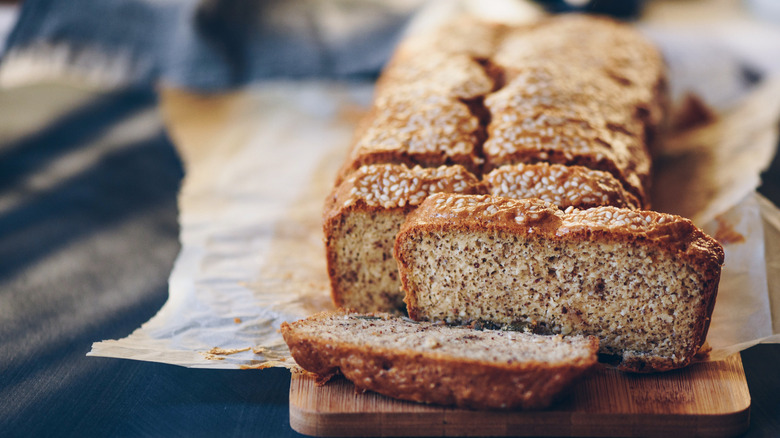 A sliced loaf of homemade bread.