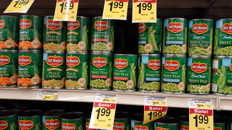 canned vegetables on grocery store shelf