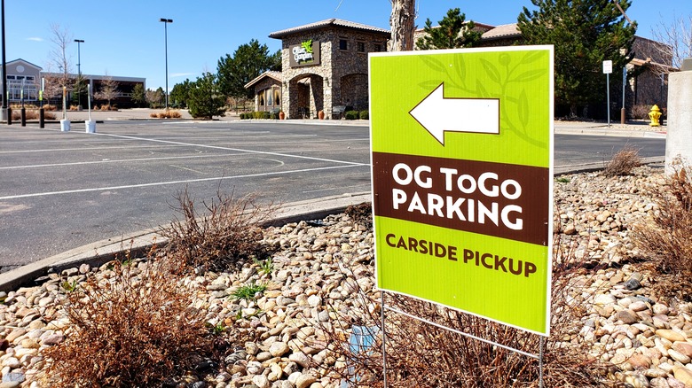 An Olive Garden delivery parking sign