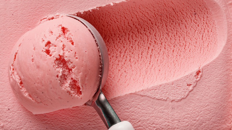 scooping pink ice cream