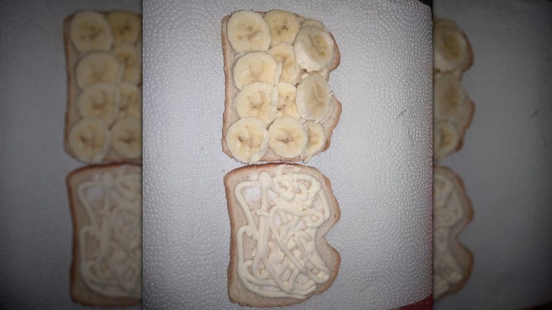 Preassembled banana and mayonnaise sandwich on a paper towel