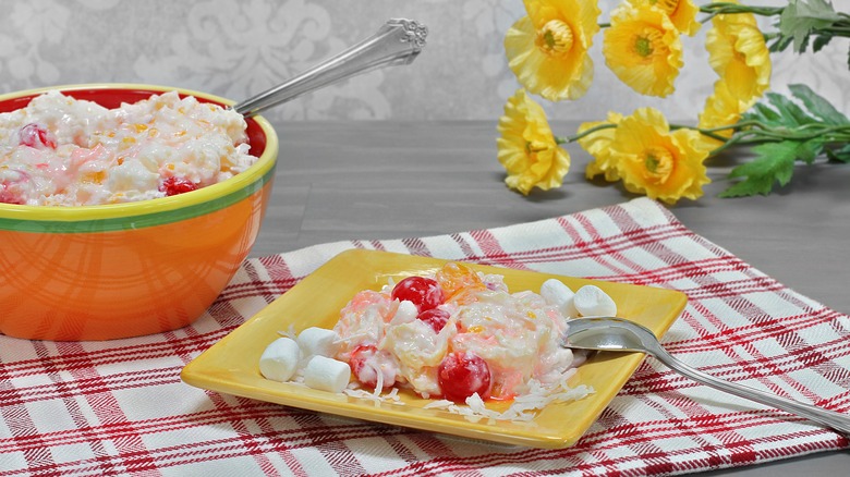 A bowl and plate of ambrosia salad