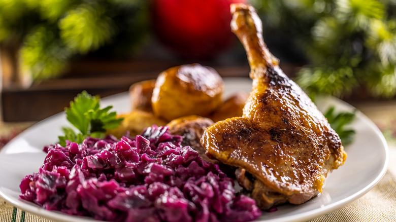 Leg of duck on a plate with cabbage