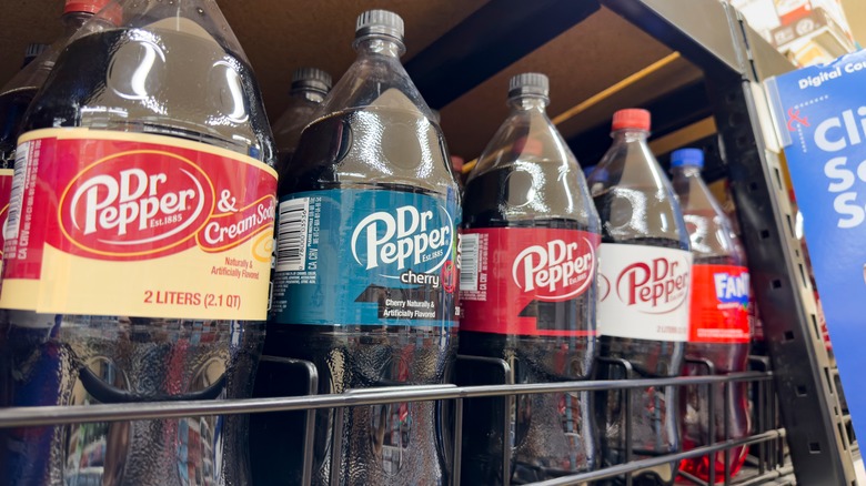 Bottles of Dr. Pepper on grocery store shelf