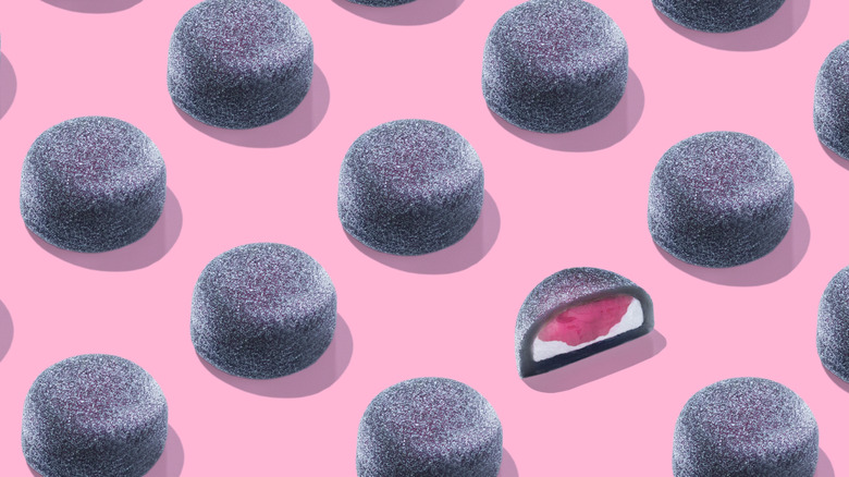 black mochi on pink background