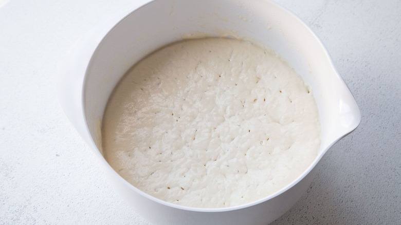 Foamy pancake batter in bowl