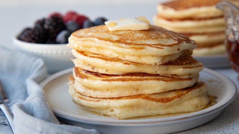 Stack of pancakes with pat of butter