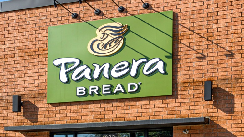 Exterior sign on a brick wall at Panera Bread restaurant