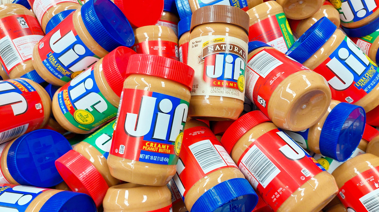 Jars of Jif peanut butter in pile