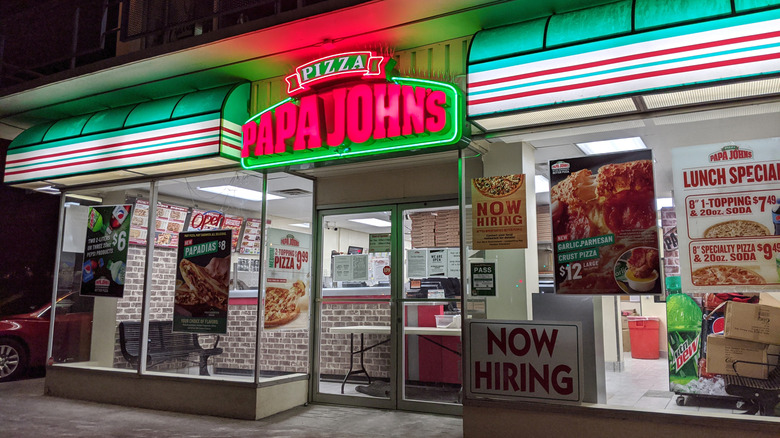 Papa Johns restaurant exterior at night