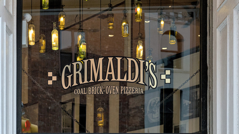 Grimaldi's Pizzeria sign on window