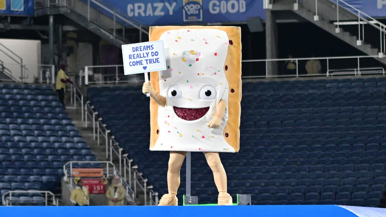 pop tarts mascot holding sign