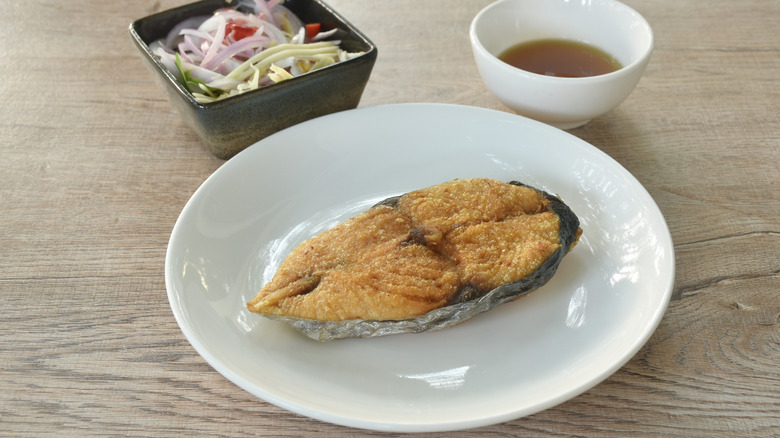 Cooked king mackerel on a plate